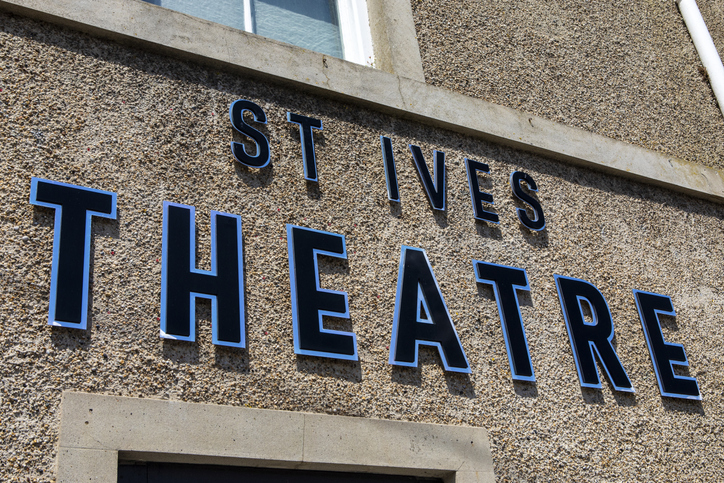 Cornwall, UK - June 4th 2021: A sign on the exterior of the St. Ives Theatre in St. Ives, Cornwall, UK.