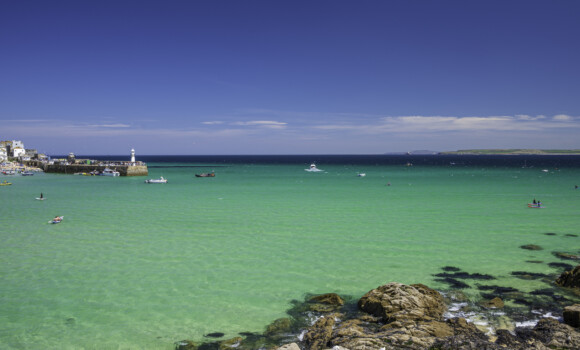 A view of the aqua coloured sea, off the coast of St. Ives, Cornwall, England, on a sunny summer's day